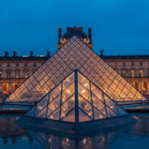 Amazing view from a Louvre Pyramid from a dark and moody day with rainy weather | SUPERPOBYT World